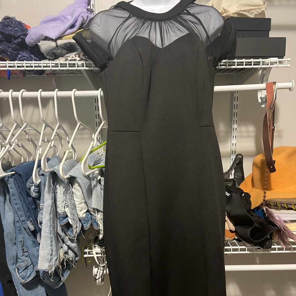 Robbie Bee dress. Size 8P. Black. Knee length.